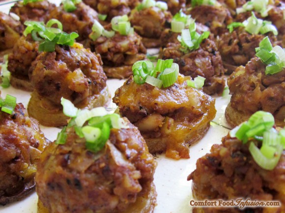 Loaded Baked Potato Bites. Baby yellow potatoes topped with vegan meat crumbles and cheddar.