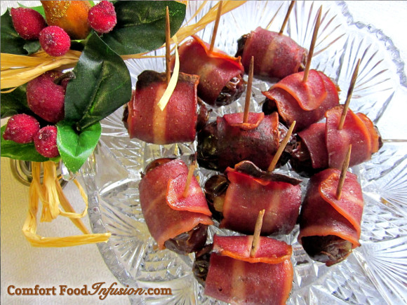 Dates in a Blanket (Rumaki). Dates filled with pineapple and wrapped in bacon.